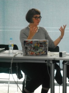 Kim presenting at the symposium during the Barcelona Network Meeting.