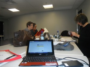 Line Grenier, Mireia Fernández-Ardèvol, and Kim Sawchuk working on the article during the Montreal Network Meeting.